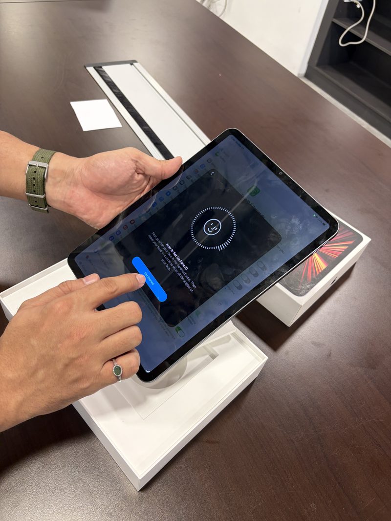 Berry Nice staff entering iPhone details on iPad to generate a quote